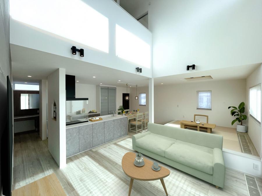 吹抜けから陽の光が差し込む開放感リビング